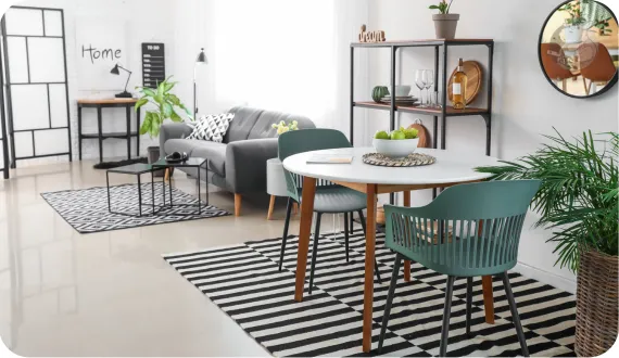 biały stół i kontrastujący kolor krzeseł